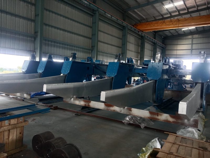 Large discharging machine fabricated in yellow and grey