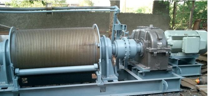 Industrial skip winch with wound cable drum